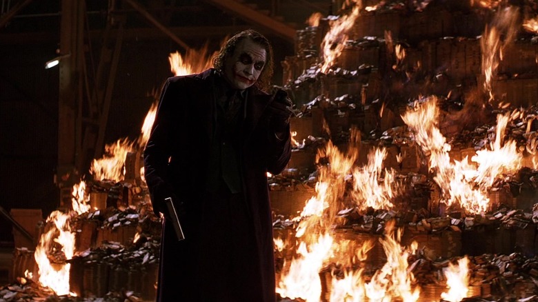 The Dark Knight Joker burning money 