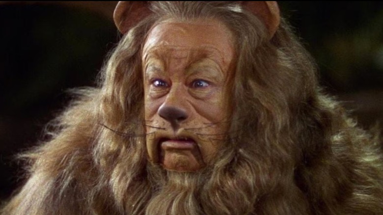 The Cowardly Lion looking scared in The Wizard of Oz