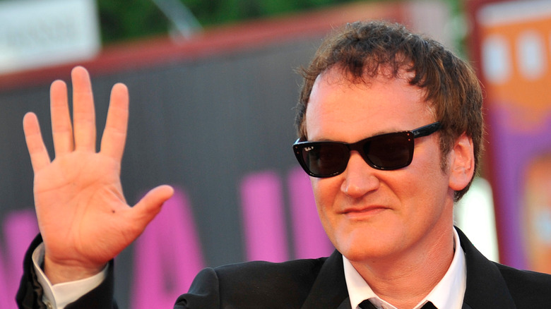 Quentin Tarantino waving to the crowd.