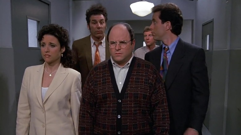 Julia Louis-Dreyfus's Elaine, Michael Richards' Kramer, Jason Alexander's George, and Jerry Seinfeld's Jerry look concerned in the Seinfeld finale