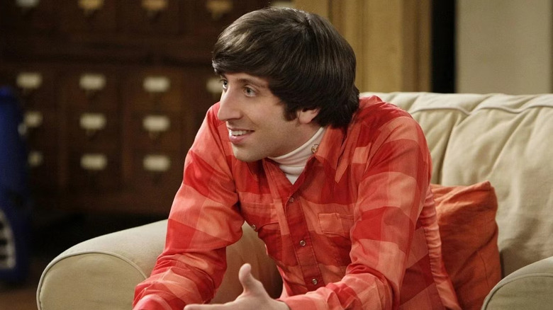 Howard leaning forward on an armchair on The Big Bang Theory