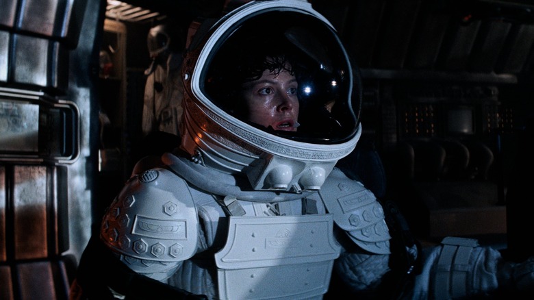 Ripley wears spacesuit