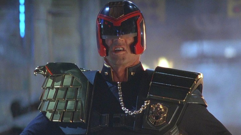 Sylvester Stallone's Judge Dredd wearing helmet and uniform in Judge Dredd