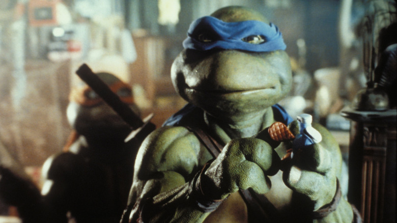 https://www.slashfilm.com/img/gallery/how-the-1990-teenage-mutant-ninja-turtles-movie-created-the-modern-superhero-comedy/intro-1633611896.jpg