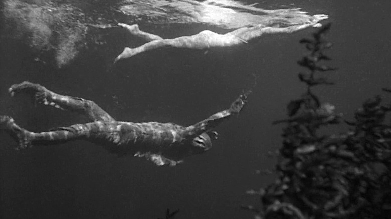 Ricou Browning swims underneath Kay Lawrence in Creature from the Black Lagoon