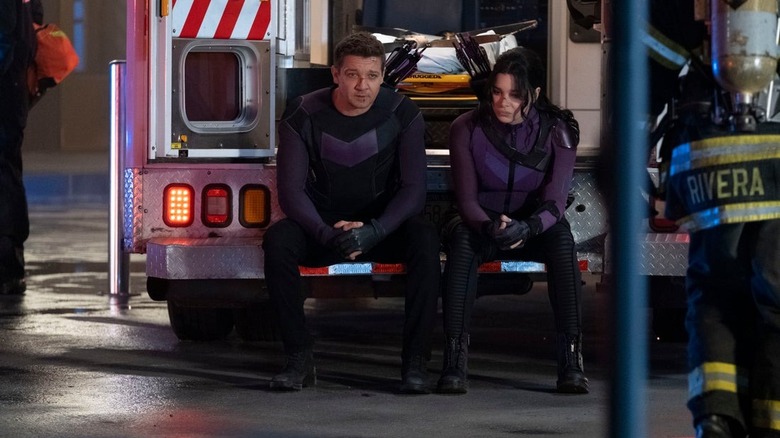 Hawkeye Hawkeye and Kate Bishop sit side by side on ambulance