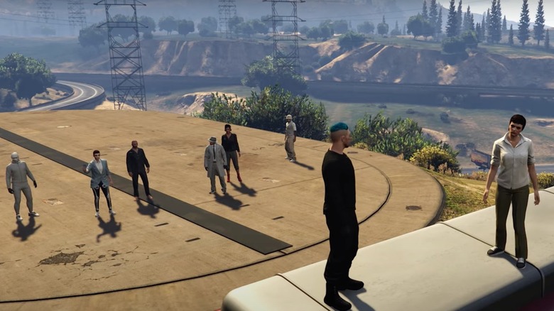 The cast practicing their performance atop a train in Grand Theft Hamlet