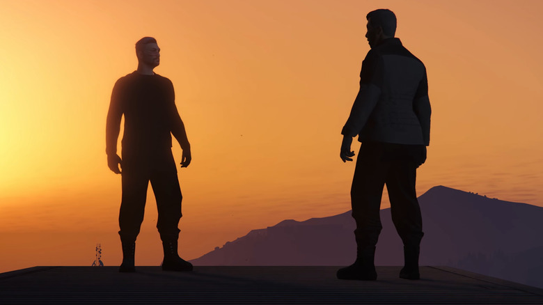 Sam and Mark standing on a hill as the sun sets in Grand Theft Hamlet