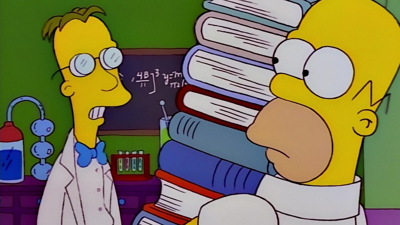 Professor Frink talking to Homer as he holds books in front of a blackboard and lab equipment in  Simpsons.