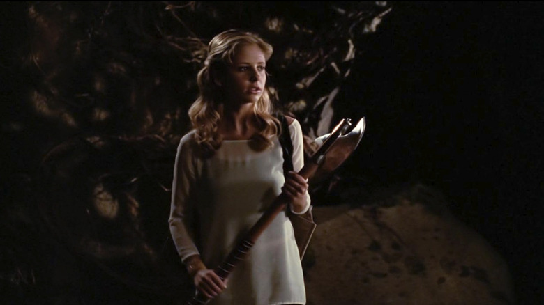 Buffy Summers holding a weapon in Buffy the Vampire Slayer