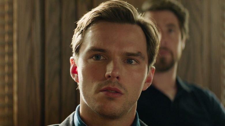 Nicholas Hoult as Justin Kemp watching the trial unfold in Juror #2