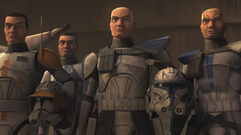 Captain Rex and some of the clones stand proud with their helmets at their side in The Clone Wars