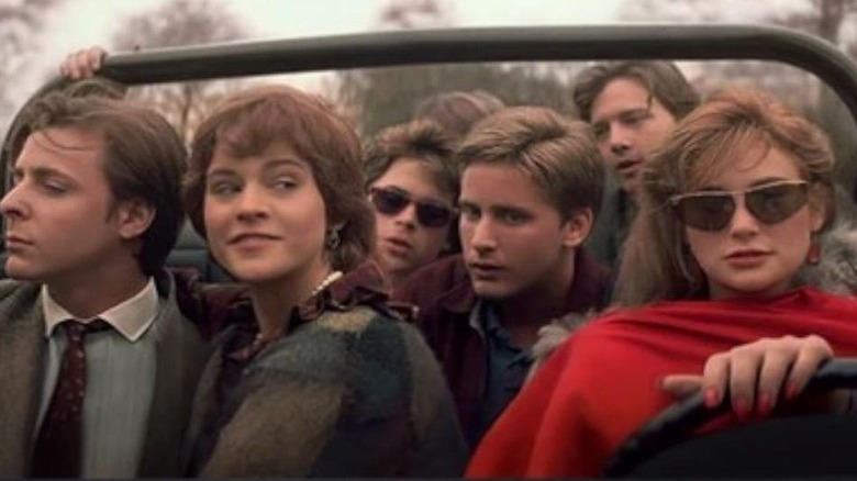 Seven friends ride in an open jeep in St. Elmo's Fire