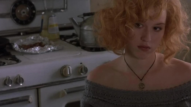 Jewel (Molly Ringwald) sits inquisitively in the kitchen in Fresh Horses