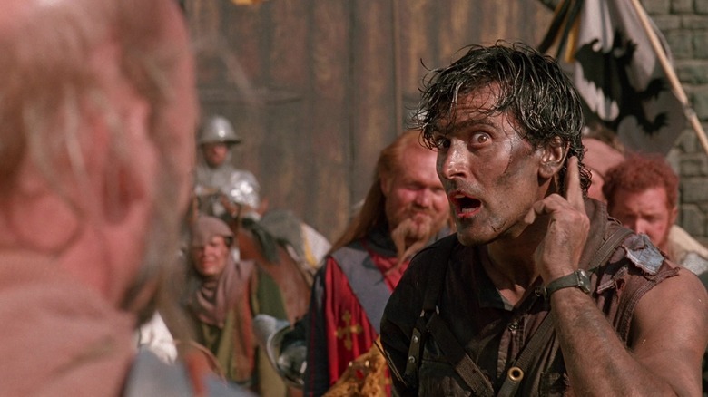 Ash, putting his finger to his ear in a condescending way in Army of Darkness.