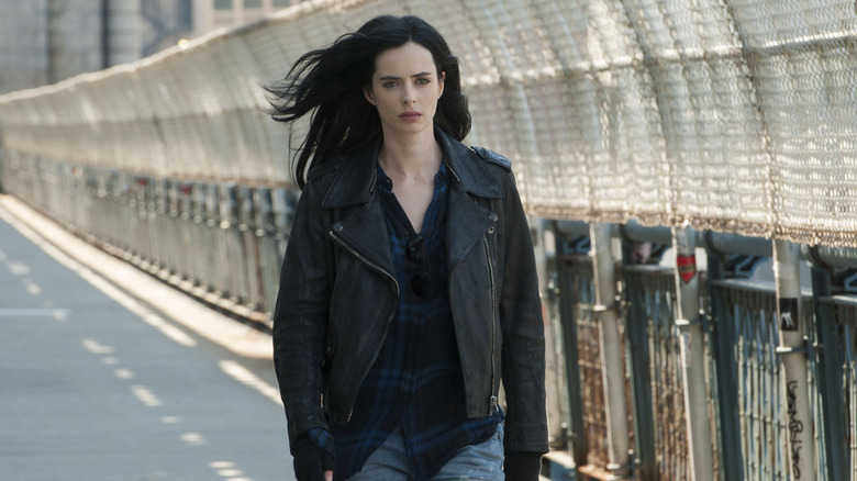 Jessica walking down the sidewalk in Jessica Jones