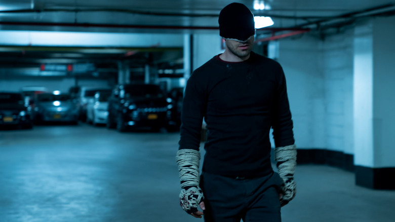 Daredevil standing in a parking garage in Daredevil