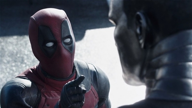 Deadpool pointing at Colossus