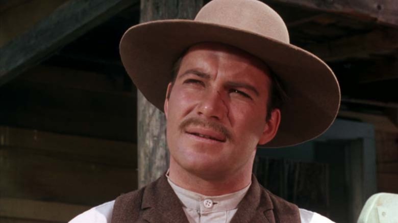 Fred Bateman, sporting a cowboy hat and a terrible mustache, on an episode of Gunsmoke.