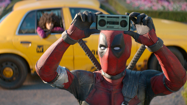 Deadpool holding up a boombox in Deadpool 2