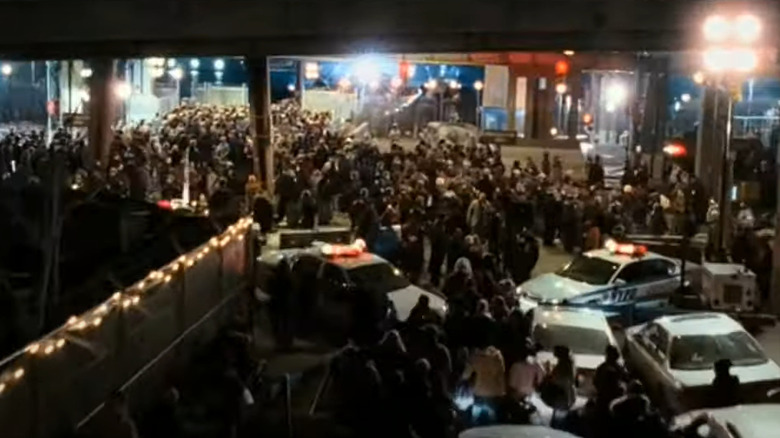 crowd under Brooklyn Bridge