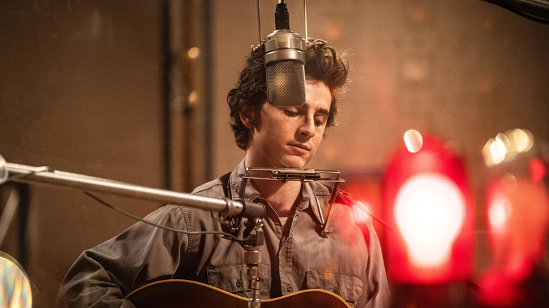 Bob Dylan in the recording booth in A Complete Unknown