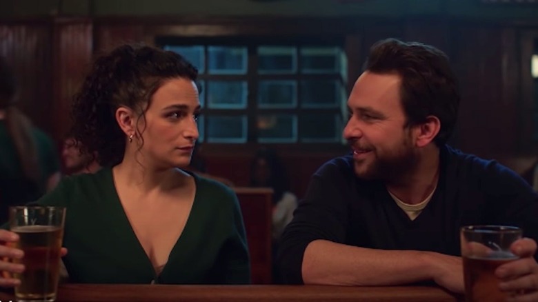 Jenny Slate and Charlie Day at a bar 