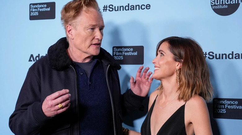 Conan O'Brien talks to Rose Byrne on the red carpet for If I Had Legs I'd Kick You