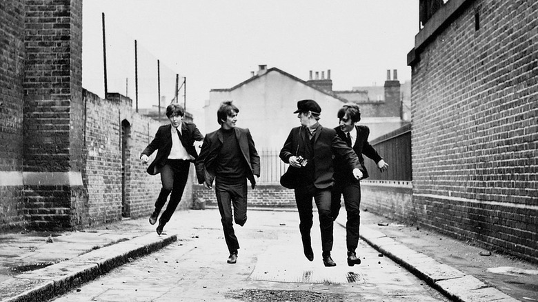 The Beatles running down the street in Hard Day's Night