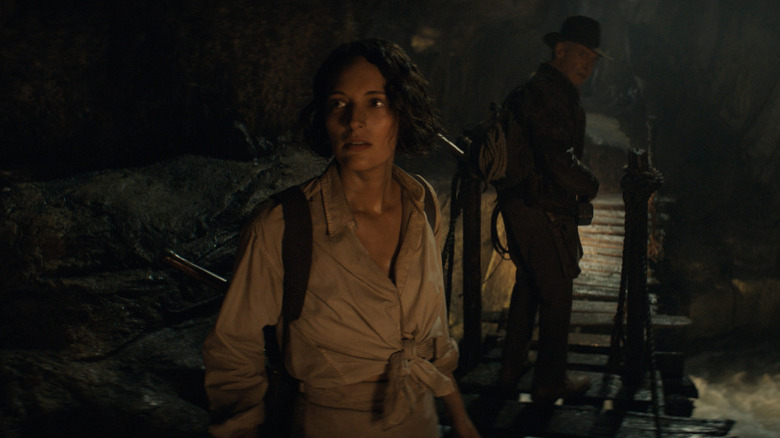 Phoebe Waller-Bridge and Harrison Ford on a bridge in Indiana Jones and the Dial of Destiny