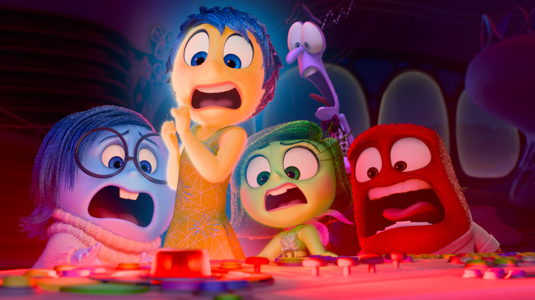 Riley's emotions screaming as an alarm goes off on the console in Inside Out 2