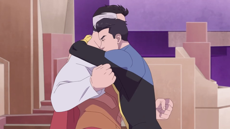 Invincible Mark hugs Nolan