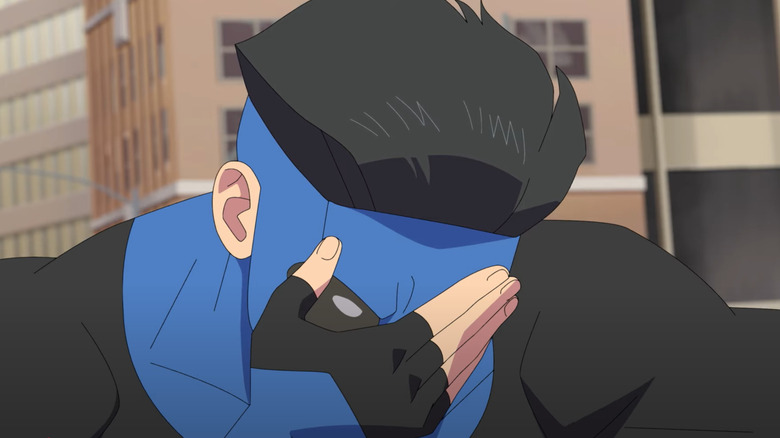 Mark holds his face in Invincible