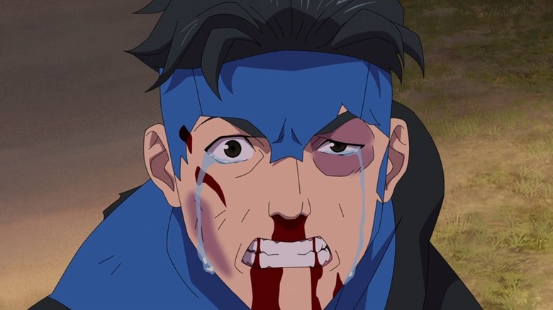 Mark crying and bleeding from his face in Invincible