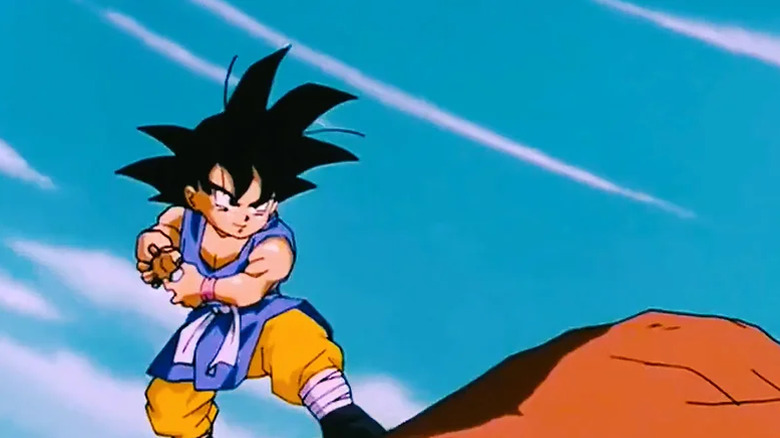 Goku as a kid launching a kamehameha wave in Dragon Ball GT