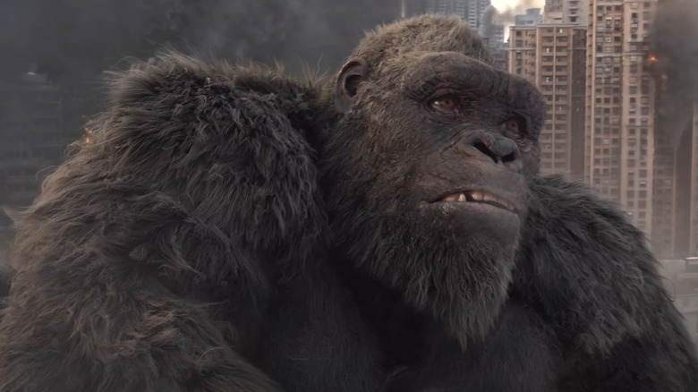 King Kong lying amidst rubble