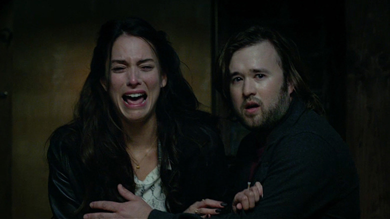 Genesis Rodriguez and Haley Joel Osment 