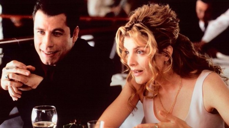 John Travolta and Rene Russo in Get Shorty