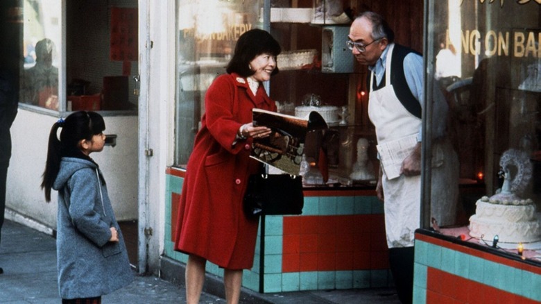 Tsai Chin holding book The Joy Luck Club