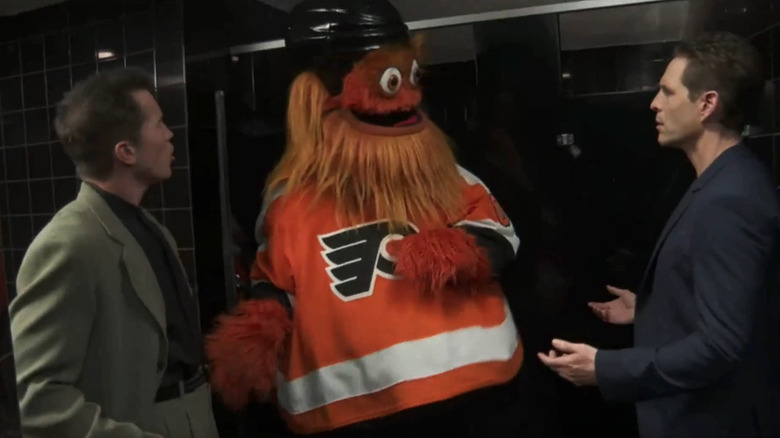 Rob McElhenney, Gritty, and Glenn Howerton in It's Always Sunny in Philadelphia