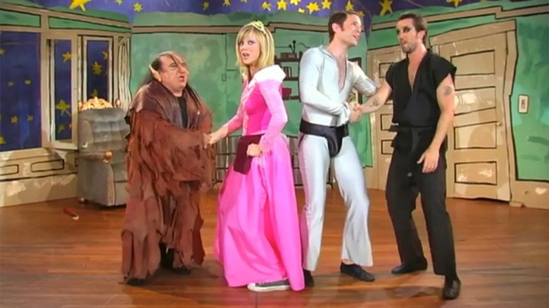 Danny DeVito, Kaitlin Olson, Glenn Howerton, and Rob McElhenney in It's Always Sunny in Philadelphia