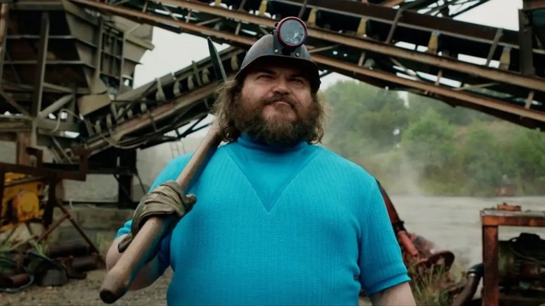 Jack Black memegang Pickaxe sebagai Steve di Minecraft