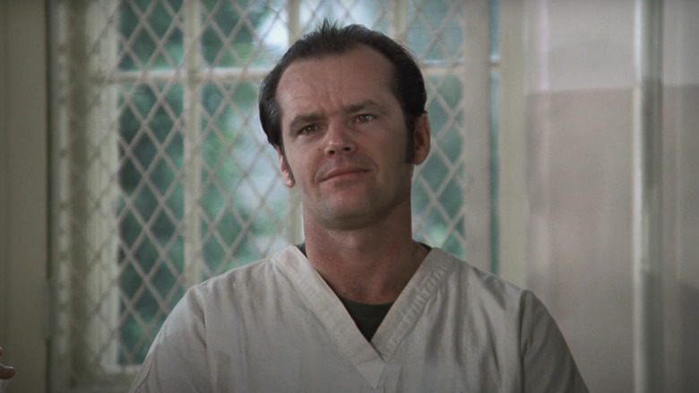 Jack Nicholson's Randle Patrick McMurphy sits in a group session in One Flew Over the Cuckoo's Nest