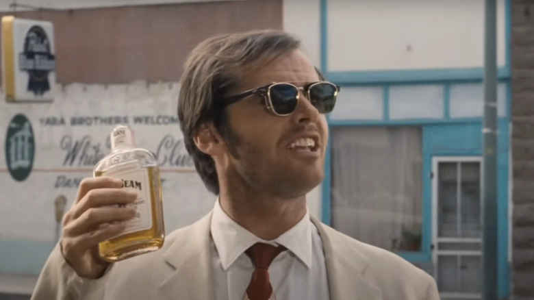 Jack Nicholson's George Hanson raises a bottle of Jim Beam in Easy Rider