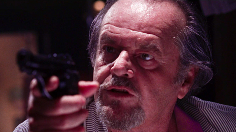 Jack Nicholson threatens Leonardo DiCaprio with a gun in The Departed