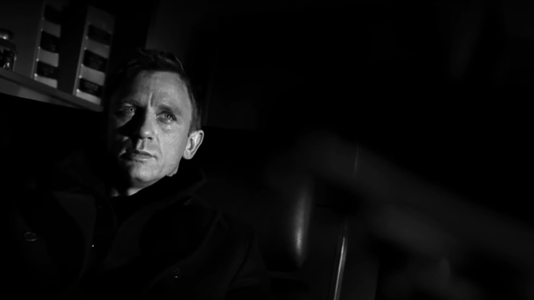 Daniel Craig's James Bond looks across frame in a shot from the opening sequence in Casino Royale