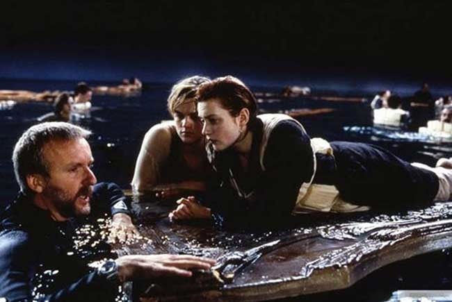  James Cameron, Leonardo DiCaprio and Kate Winslet on the set of Titanic.