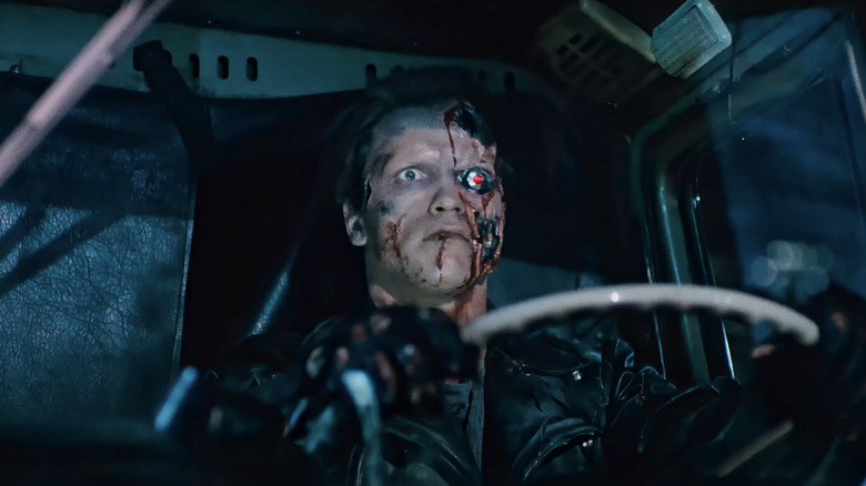 Arnold Schwarzenegger's Terminator sits behind the wheel of a truck in The Terminator