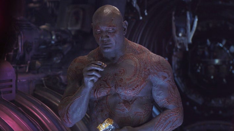 Drax eating a zargnut, thinking he is invisible in Avengers: Infinity War