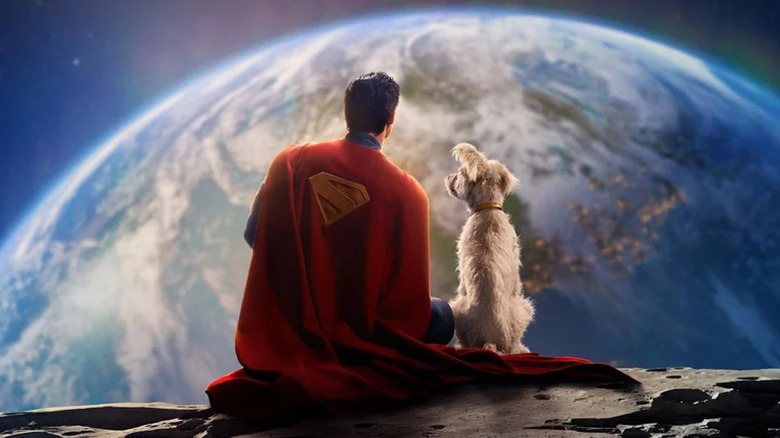 David Corenswet as Superman and Krypto the dog sitting on the moon looking down on Earth in Superman 2025